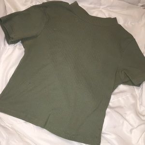 Lightly worn pale green crop top